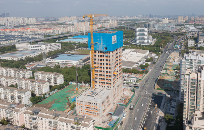 1731321155954559.jpg 湖西警務(wù)中心項(xiàng)目封頂圖片.jpg